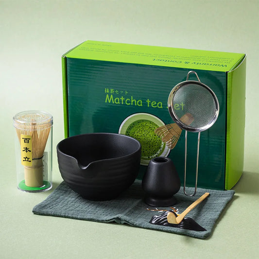 black Matcha tea set with a green box labeled 'Matcha tea set' on a light green background.